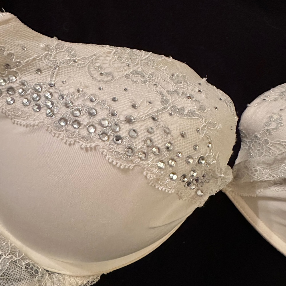 Victorias Secret - 38D - Ivory bra with rhinestone embellishments.